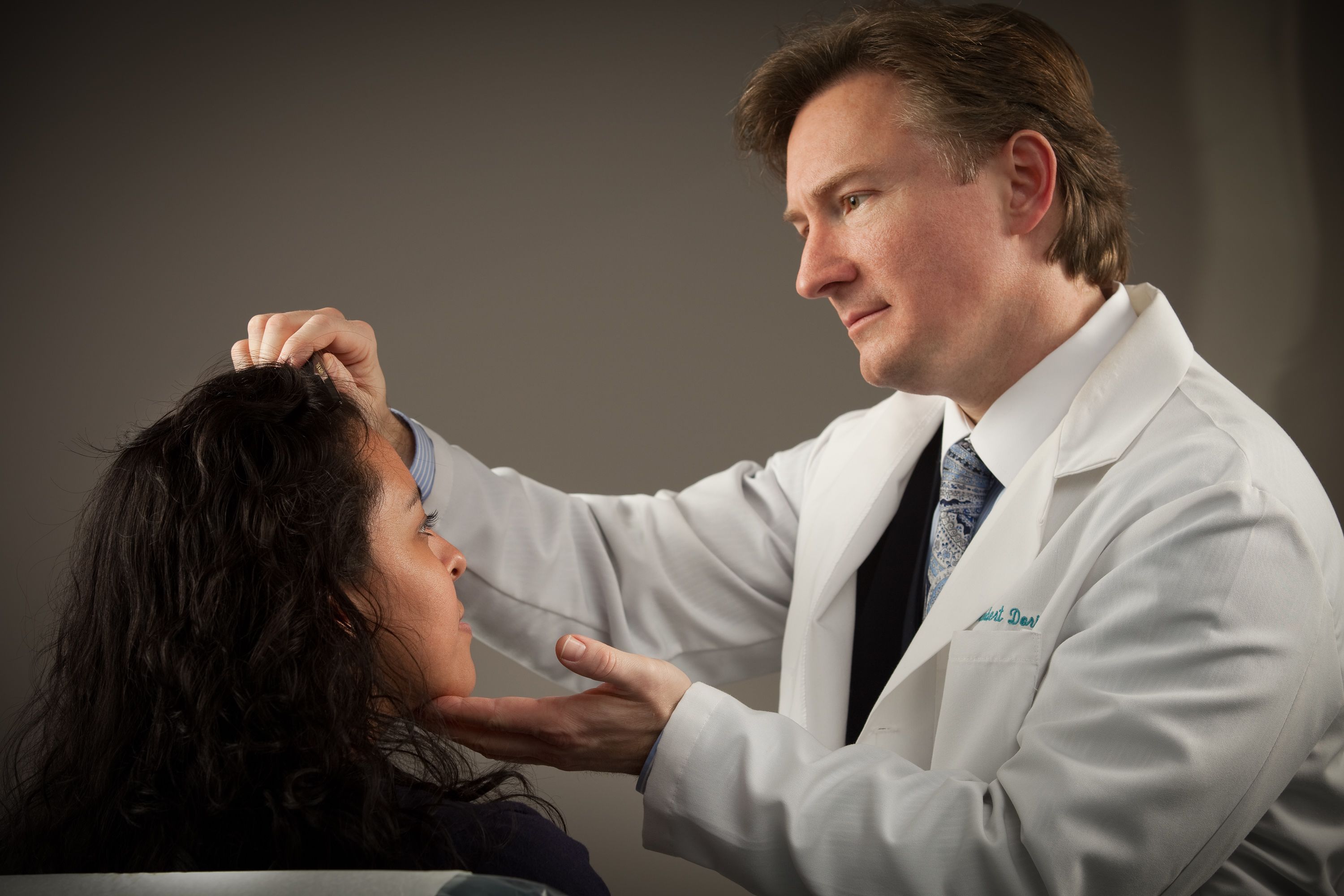 Dr. Dorin examining a patient